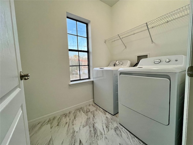 laundry area featuring independent washer and dryer