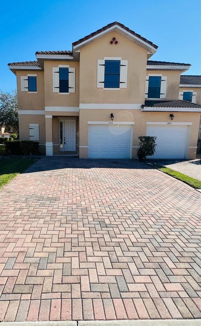 view of front of property featuring a garage