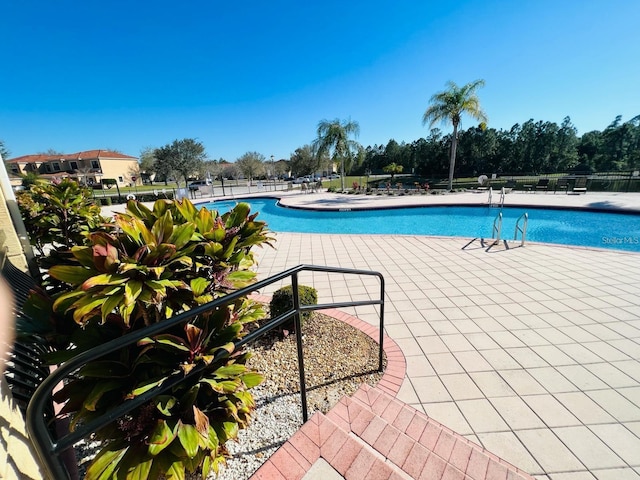 view of pool with a patio area