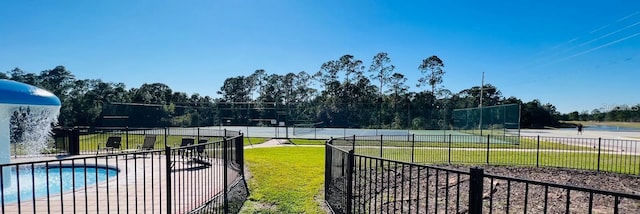 view of home's community with a lawn and a pool