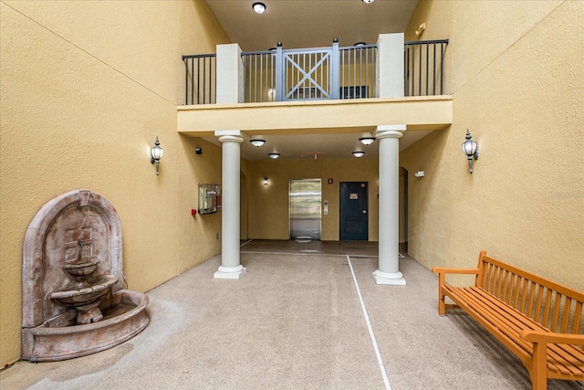 entrance to property featuring a balcony