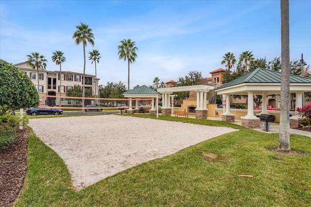 view of home's community with a gazebo, a yard, and volleyball court