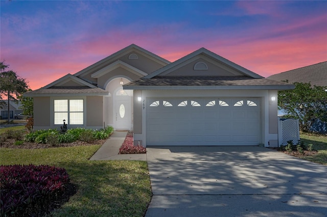 view of front of home featuring a garage