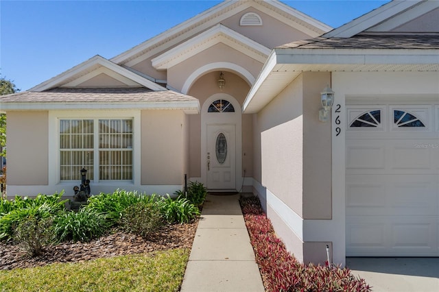 entrance to property with a garage