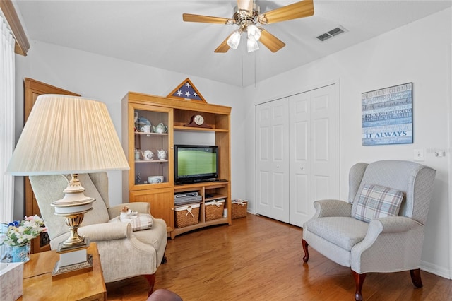 interior space featuring ceiling fan and hardwood / wood-style flooring