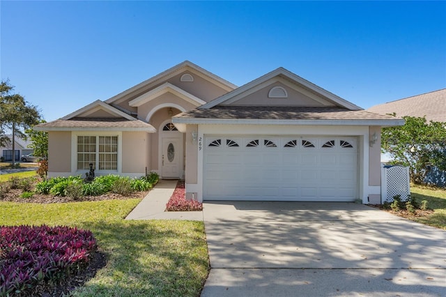 view of front of house with a garage