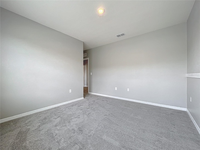 unfurnished room with carpet