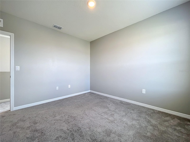 empty room with carpet floors