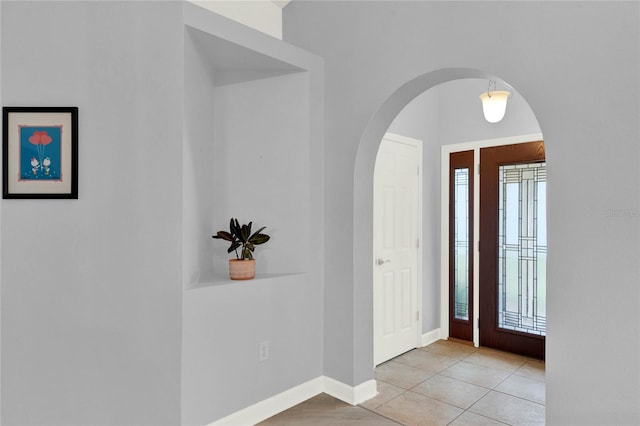 view of tiled foyer entrance