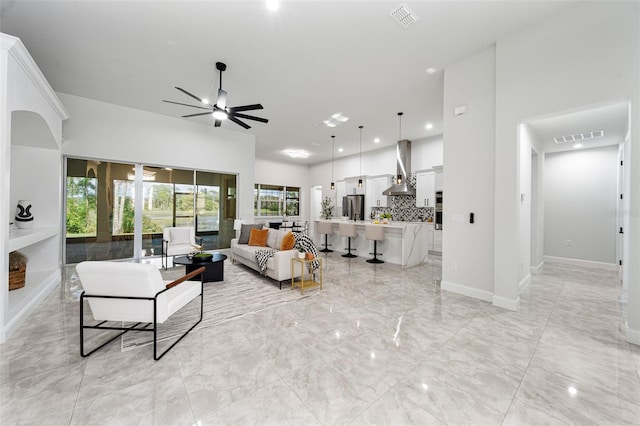 living room with ceiling fan