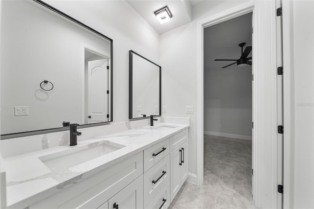 bathroom featuring ceiling fan and vanity