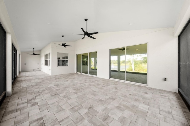 unfurnished sunroom with vaulted ceiling