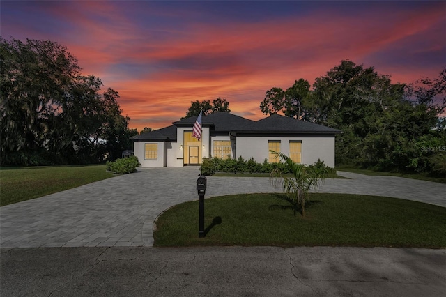 view of front of home featuring a yard