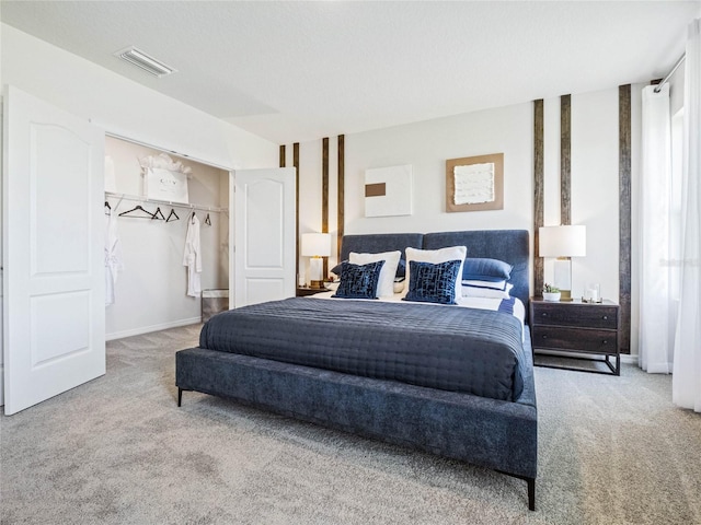 bedroom featuring a closet and carpet flooring