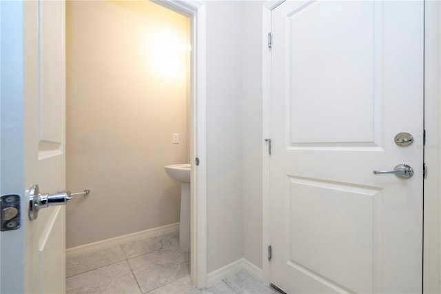 bathroom with tile patterned flooring