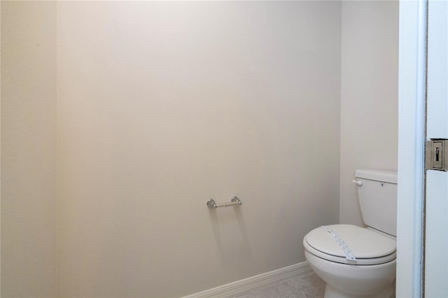 bathroom featuring toilet