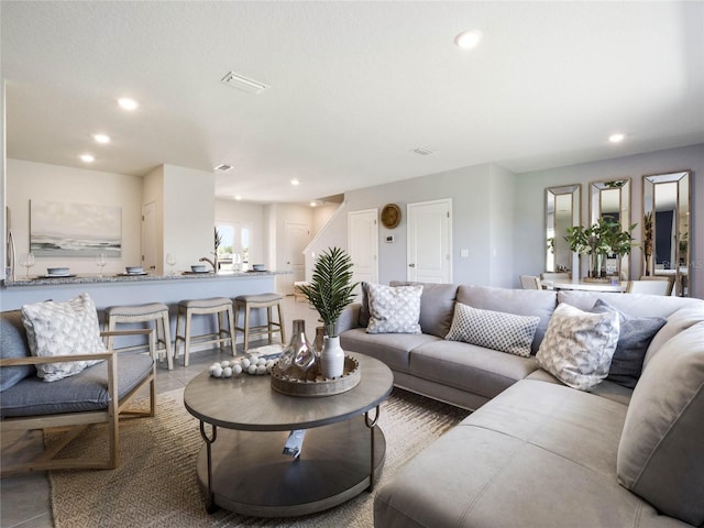 living room with light tile patterned floors