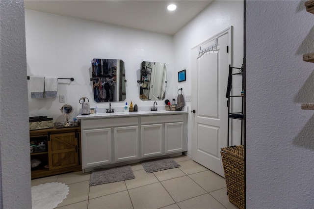 bathroom with vanity and tile patterned floors