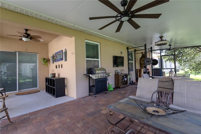 view of patio / terrace featuring a grill and ceiling fan