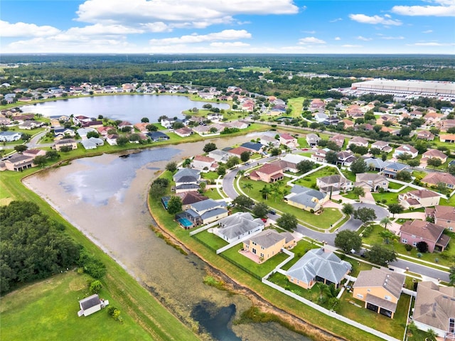 aerial view featuring a water view and a residential view