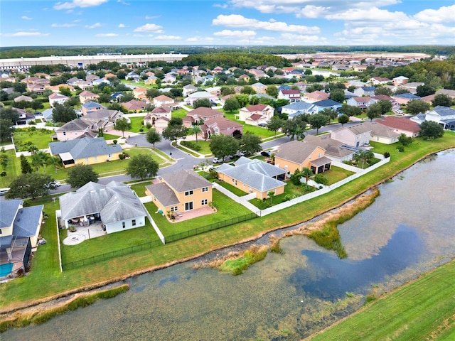 aerial view featuring a residential view and a water view