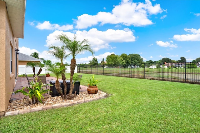 view of yard featuring a fenced backyard