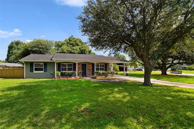 ranch-style house featuring a front lawn