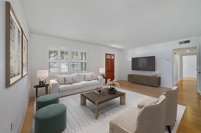 living room featuring light wood-type flooring