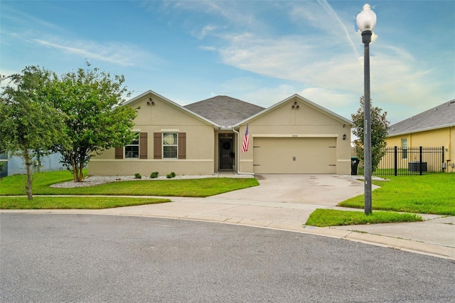 single story home featuring a front yard and a garage