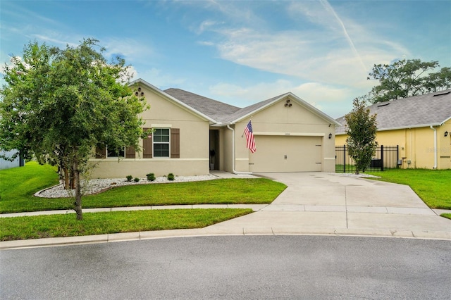 ranch-style home featuring a front lawn and a garage