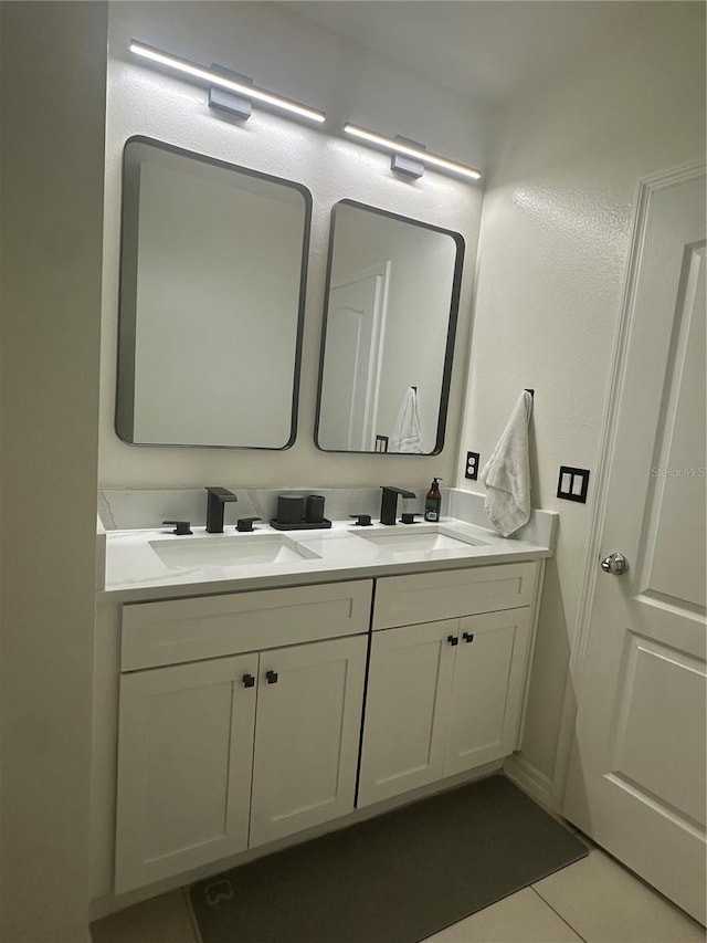 bathroom featuring vanity and tile patterned flooring