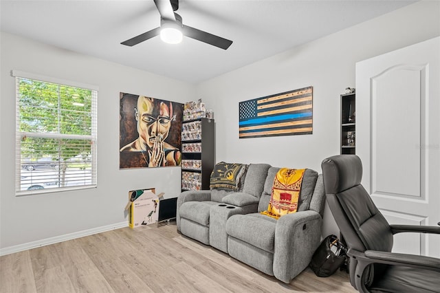 interior space with ceiling fan and light hardwood / wood-style flooring