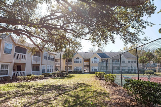 surrounding community featuring a lawn