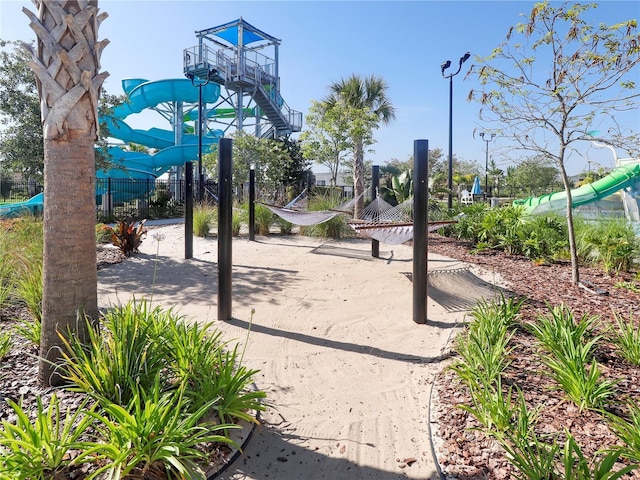 8938 Cabot Cliffs Dr, Davenport, FL 33896 - view of playground featuring fence