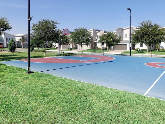 8938 Cabot Cliffs Dr, Davenport, FL 33896 - view of sport court with community basketball court, a lawn, and a residential view