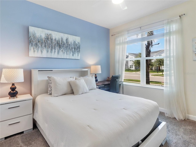 8938 Cabot Cliffs Dr, Davenport, FL 33896 - carpeted bedroom with baseboards