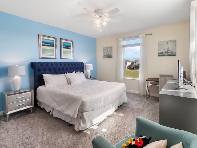 8938 Cabot Cliffs Dr, Davenport, FL 33896 - bedroom with light colored carpet, baseboards, and a ceiling fan