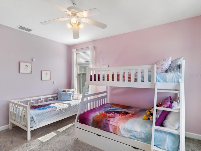 8938 Cabot Cliffs Dr, Davenport, FL 33896 - bedroom featuring carpet floors, ceiling fan, and baseboards