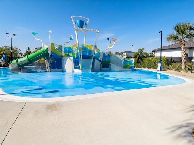 8938 Cabot Cliffs Dr, Davenport, FL 33896 - view of pool with fence