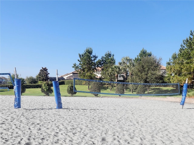8938 Cabot Cliffs Dr, Davenport, FL 33896 - view of property's community with volleyball court and a lawn