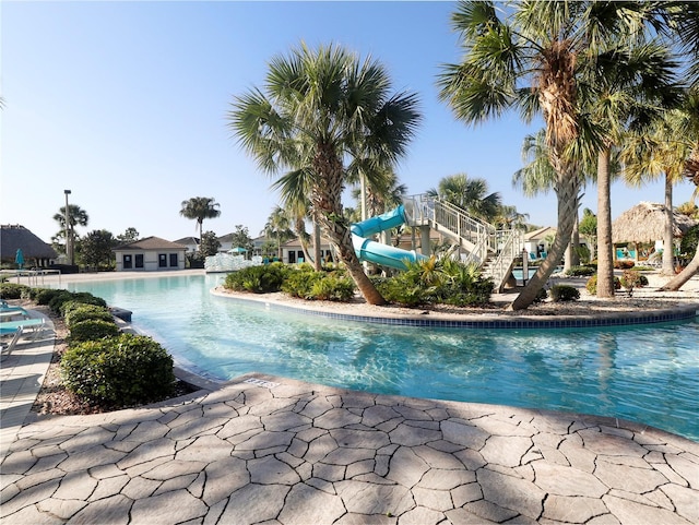 8938 Cabot Cliffs Dr, Davenport, FL 33896 - community pool with stairway and a patio