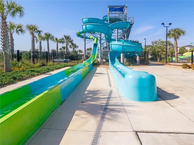 8938 Cabot Cliffs Dr, Davenport, FL 33896 - community jungle gym featuring fence