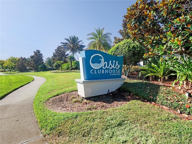 8938 Cabot Cliffs Dr, Davenport, FL 33896 - community sign featuring a lawn