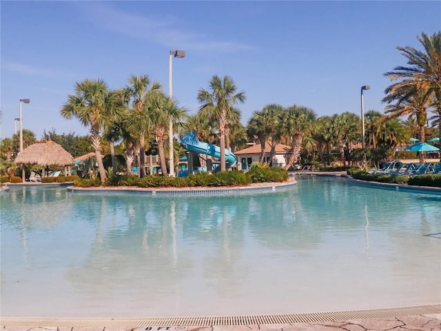 8938 Cabot Cliffs Dr, Davenport, FL 33896 - community pool with a water slide
