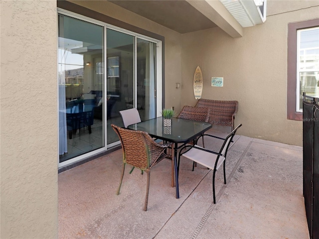 8938 Cabot Cliffs Dr, Davenport, FL 33896 - view of patio / terrace with outdoor dining area