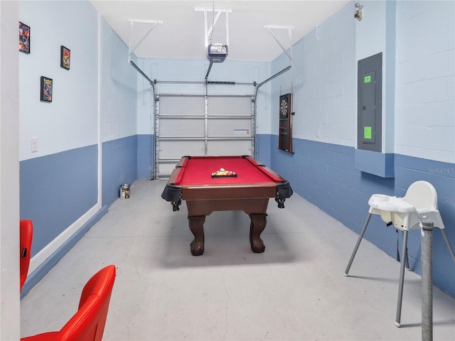 8938 Cabot Cliffs Dr, Davenport, FL 33896 - rec room featuring electric panel, concrete floors, billiards, a garage, and concrete block wall