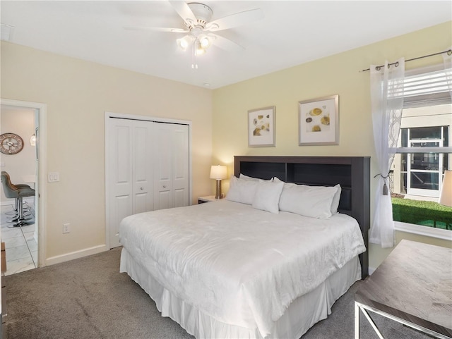 8938 Cabot Cliffs Dr, Davenport, FL 33896 - bedroom with a closet, baseboards, and a ceiling fan
