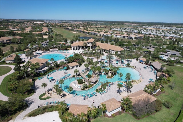 8938 Cabot Cliffs Dr, Davenport, FL 33896 - aerial view of property and surrounding area featuring a pool and nearby suburban area