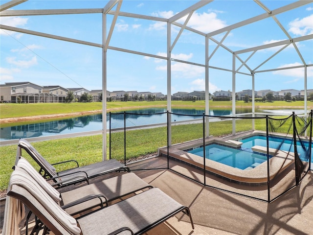 8938 Cabot Cliffs Dr, Davenport, FL 33896 - view of pool featuring a lawn, a residential view, a lanai, and a water view