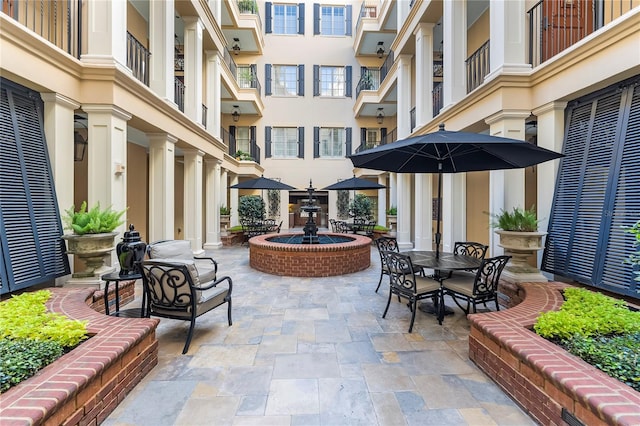 view of patio with a balcony